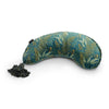 An eye mask with a tropical leaf pattern in shades of green, blue, and yellow, shaped to fit over the eyes and bridge of the nose, featuring a black elastic strap and lumbar support - LAST CHANCE: DockATot La Maman Wedge - Navy Night Falls.